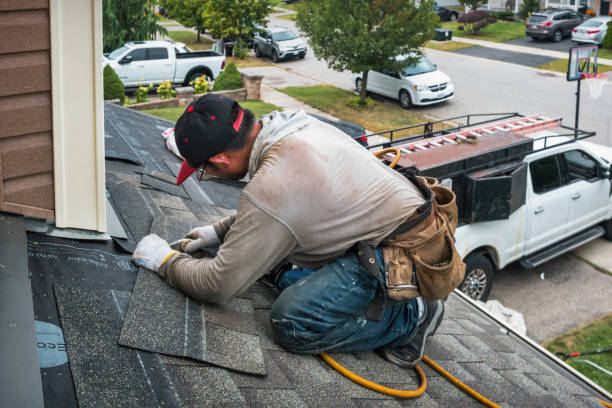 Professional Roof Replacement technician working in Martinsville, IL
